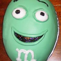 Ian's 17Th B'day Cake. M&m As usual, his favorite all lemon cake, icing, fondant & curd filling. And of course his favorite colour ''green''...