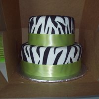 Zebra Striped Wedding Cake red velvet cake,cream cheese icing, coverd in fondant. real green ribbon