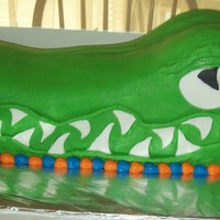 3D Gator Head yellow cake, bc fosting, fondant teeth