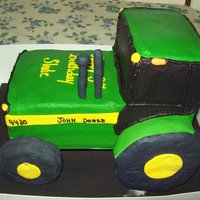 3D John Deere Tractor french vanilla cake, frosted in bc, rk's tires coverd in fondant