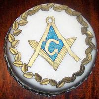 Birthday Cake - Masonic My son's 43rd b'day. Another lemon explosion cake; lemon cake, lemon BC icing, lemon MMF fondant & decorations, sparkle dust...