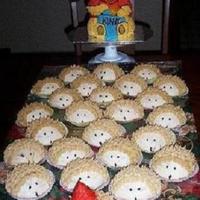 Winnie The Pooh Cake & Hedgehog Cupcakes Looking through old photos (pre-digital camera) I came across cakepictures to add. This one is Winnie the Pooh (bear pan) for the at home...