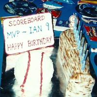 Ian's 9Th Cakes are a carved baseball bat and a ball pan baseball cake. Cakes are lemon with lemon curd filling, lemon BC icing. Scoreboard is royal...