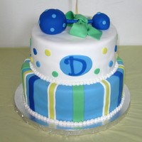 Blue Baby Rattle This is the first cake I've ever made for someone else. The bottom is choc pound cake and top is carrot cake. All covered in MMF with...