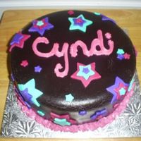 Choc Fondant Star Cake Vanilla cake with choc pudding filling and homemade choc fondant.