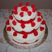 Red And White Wedding Cake My first official wedding cake. The bride's mother requested red and white. The roses are duff roses.