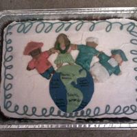 Around The World i made this cake for my dads class.he works at an international school.i made the world and people out of fondant