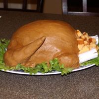 One Of Many!! Here is my shot at the turkey cake. I was pretty proud of myself for pulling it off. My family was impressed so it was worth it. Thanks for...