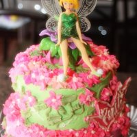 Tinkerbell Cake 8" and 6" buttercream cake with strawberry and pineapple fillings. Design inspiriation from CC.