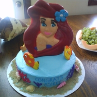 Little Mermaid strawberry cake w/strawberry filling, fish/royal icing cookies, and an ariel chocolate mold.