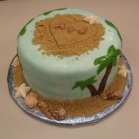 Beach Bridal Shower Cake This was made for a co-workers bridal shower. She is getting married in Florida on a beach. Fondant covered with brown sugar for sand.