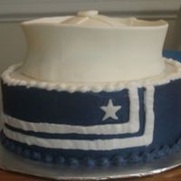 Sailor Hat 8 inch round yellow cake with BC frosting. The hat is made of 50/50 gumpaste and fondant thank you to fellow CCers for the inspiration!