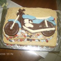 Motorcycle Chocolate cake with chocolate motorcycle with chocolate rocks.