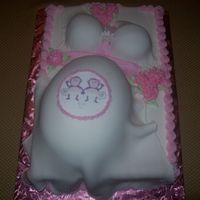 100_0256.jpg First Pregnant cake. Next time I need to put the boobs closer to the belly still proud of it. It was my first try.