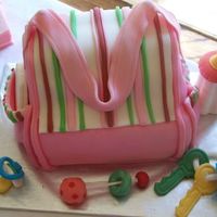 Marisa Baby Shower Diaper Bag 1st Diaper Bag Cake. BIG thanks to helipops for the help and inspiration!!! Accessories are all fondant, too.Mom to be is having a girl.......