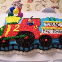 Train Birthday Cake Used Wilton pan. Used BC icing for everything. First try at this cake - still working on perfecting writing. Luckily it was for my little...