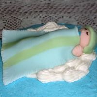 Baby Boy Cake Topper Baby boy made from fondant.