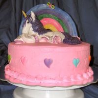 Unicorn Birthday Cake 10" Springfetti cake, filled/iced with buttercream. Sugar hearts, fondant rainbow and unicorn. For a 7th birthday party.