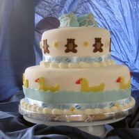 Baby Shower Cake Ducks and Teddy Bear theme. At Mom-to-be's request the entire cake is Cherry chip filled and iced with buttercream. Covered with...