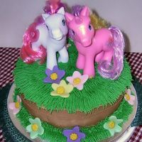 My Little Pony Birthday Cake 8" Funfetti cake filled and iced with buttercream and fondant accents. The My Little Ponies were real so the birthday girl could keep...
