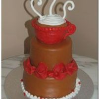 Coffee Lover's Cake Red velvet cake with cream cheese frosting, covered in fondant. The coffee mug is cake covered with candy clay and fondant. Bow is fondant...