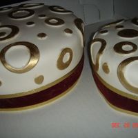 Anniversary Cakes These are some cakes that I made for an anniversary. They are covered in white fondant and accented with gold painted overlays and real...