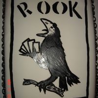 Rook Card Cake 13x9 covered with fondant, Rook bird handpainted with black food coloring.