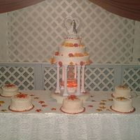 Fall Mums And Leaves Wedding Cake This is the bridal cake I did this weekend. I used artifical mums. The reception hall was beautifully decorated in fall colors and the mums...