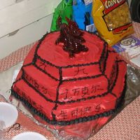 9Th_Birthday_Cake.jpg I made this cake for my Son's 9th Birthday. He had an Asian Party. I wrote in chinese....9 around the top layer, His name around the...