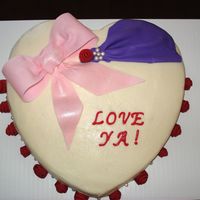 First Anniversary Buttercream w/ fondant bow and accents for couples first anniversary.