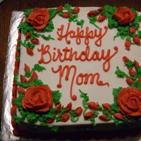 Red Rose Birthday For Mom 8inch square chocolate cake with buttercream icing and buttercream roses.