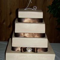 Square Stacked Wedding Cake Square stacked wedding cake. White cake with buttercream icing. Bottom cake is 16" dummy cake and then 12, 10, 8 white cake layers....