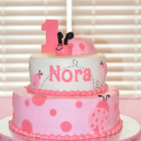 Pink Ladybug This was so fun to make! It was a 10 inch bottom and 7 inch top with buttercream and fondant accents. The smash cake was a 6 inch that...