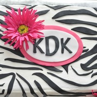 Zebra!! To me, simple is always better. Marbled chocolate and vanilla 9x13 sheet cake. I used Duff's new black fondant that Michael's...