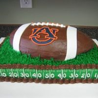 Auburn Football Cake This idea was from the cake from Miller123. I used a 9x13 and the football cake pan. Iced with bc and fondant accents on the football. I...