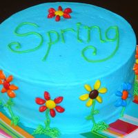 Spring Flower Cake Just a quick cake for a family 'reunion' of sorts. Devils food cake with buttercream frosting and M&M flowers.