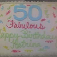 Mom's Birthday Cake This is the cake that I made for my mom's 50th Birthday. Its all done in buttercream.