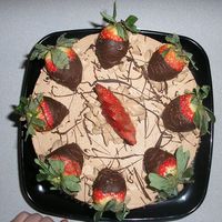 Yummy double chocolate cake with whhipped dark chocolate ganshe and dipped strawberry's