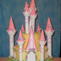 Fairytale this was done for a friends grandaughter turning 3. It is my first 1 to make. i need more practice the towers are leaning but the little...
