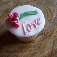 Love I made the tiny roses to go on some other cupcakes I was making but in the end they were so small they got lost so I decided they needed a...