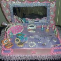 Vanity Set Full sheet cake with Butter cream icing all accessories made with fondant this cake was made for my daugther's 8th birthday