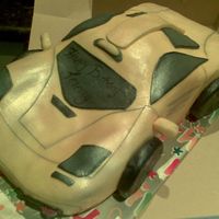 Mclaren F1 - Gtx Chocolate cake with ganash and MMF. picture isn't the best it's actually a really nice egg yellow colour! Birthday cake for car...