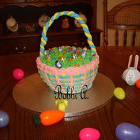 Easter Basket Poppyseed cake w/ lightly lemon flavored BC and fondant handle.