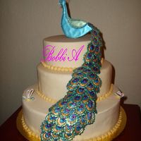 Pretty As A Peacock Dummy cake made for the AZ Cake Contest. The original cake was a birthday cake for my m-i-l and niece. The original was a carrot cake with...