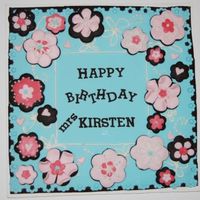 Flower Cookie Cake 10" cookie cake made for DD's preschool teacher. dark chocolate cookie with fondant cover. flowers are individual cookies too....