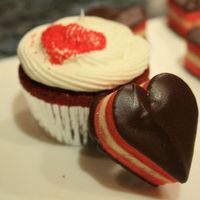 Img_0290.jpg The Cookie is a tri colored cookie made with almond paste. I uses red food coloring for the outside cookies and left the inside cookie...