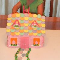 Dollhouse Cake I made this cake for my daughter's 2nd birthday. I got the idea and instructions off Parents.com. It was 2 9x13 strawberry cakes...