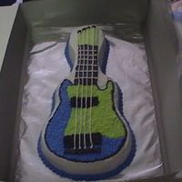 Guitar Cake This was the first cake I sold. Made with BC icing. I used the guitar pan made by wilton.