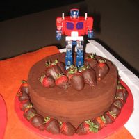 Transformers Chocolate Cake A surprise for my brother, he requested the chocolate zucchini cake and ganache. He saw Optimus Prime immediately when they made their...