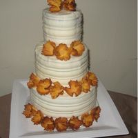 Dried Pineapple Flower Cake 4, 6, 8 rounds of hummingbird cake with cream cheese icing. Tried my new Wilton decorating triangle... wouldn't do it again with a...